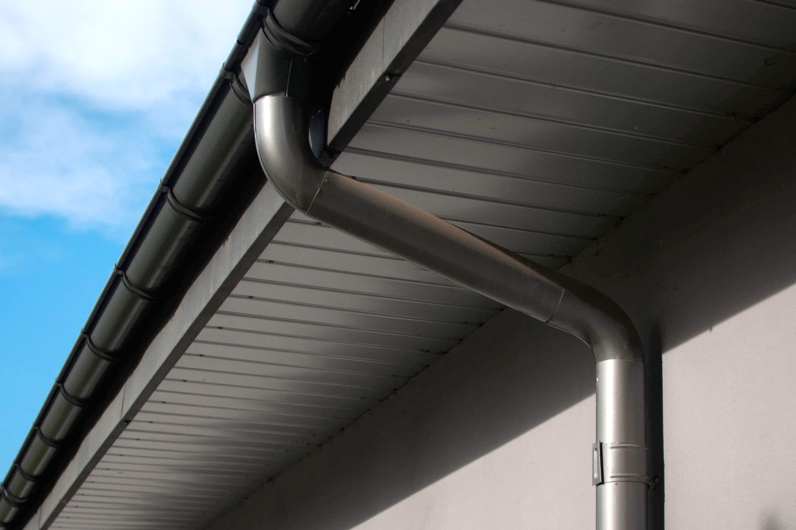 Corrosion-resistant galvanized gutters installed on a commercial building in Staten Island